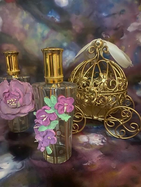 Picture of Perfume bottle decorated with flowers
