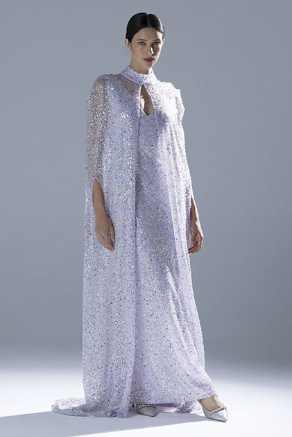 Picture of Lavender sequin dress with deep v-neckline and detachable cape.