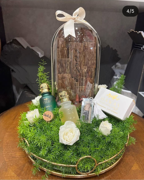 Picture of Cambodian oud with flowers and perfumes