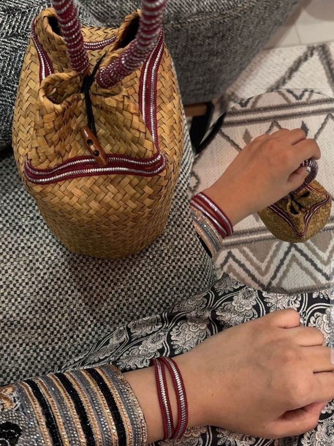 Picture of A bag with a bracelet from the tail