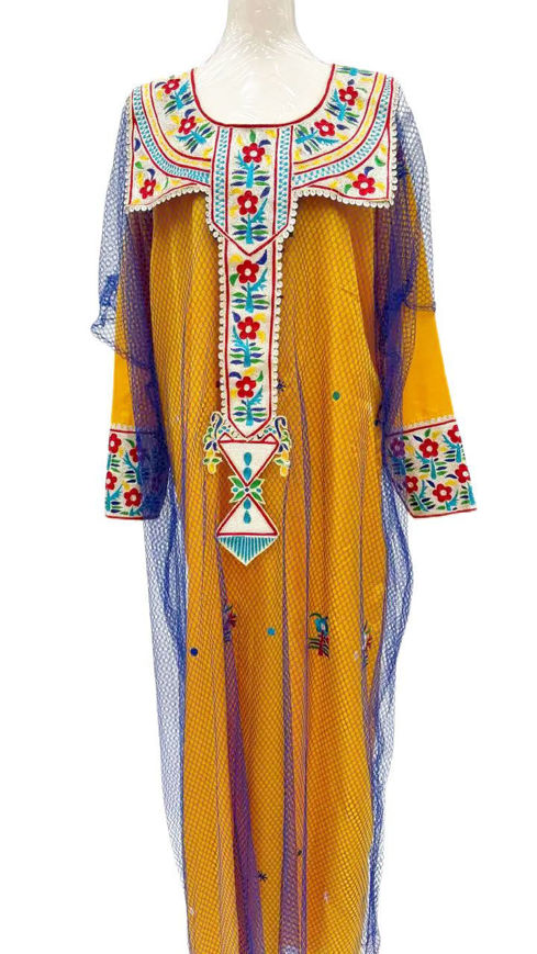 Picture of A dress and a kandora embroidered with a tulla