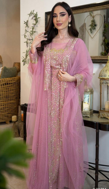 Picture of Dress for occasions. Two pieces of pink beaded with matte gold and a pair of hand-made