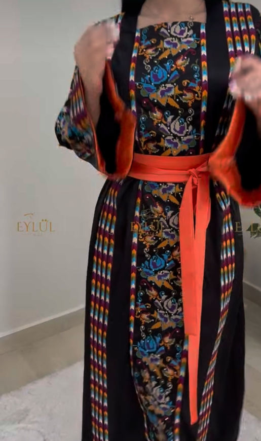 Picture of Black colourful embroidered dress with an orange belt
